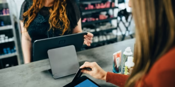 Why your card payment clears instantly but merchants wait days — and how that is changing