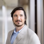 Robinhood plans AI trading accounts for retail investors, but CEO Vlad Tenev warns everyone using the same models will struggle to win