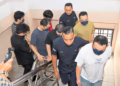 Seven Chinese nationals, three of them students, plead not guilty over alleged Forest City crypto scam