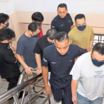 Seven Chinese nationals, three of them students, plead not guilty over alleged Forest City crypto scam