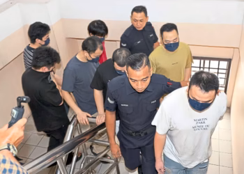 Seven Chinese nationals, three of them students, plead not guilty over alleged Forest City crypto scam